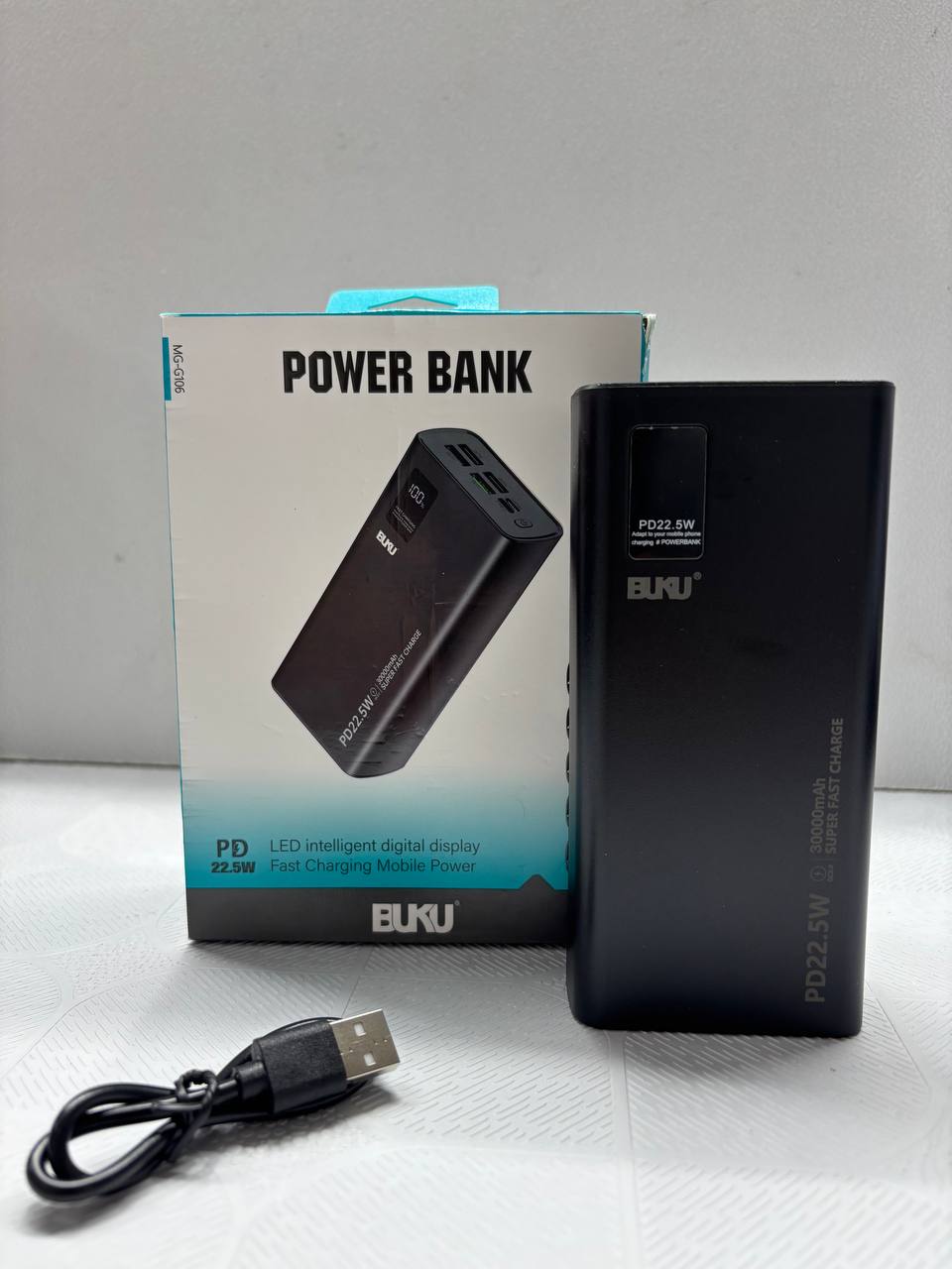 پاوربانک ۳۰۰۰۰ میلی‌آمپرساعت بوکو (BUKU) مدل MG-G106 توان 22.5W