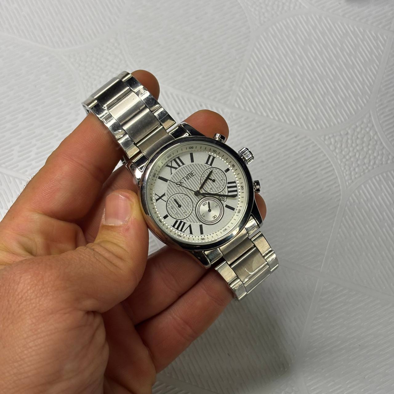 ساعت مچی مردانه اس کی تایم SK TIME تمام استیل نقره‌ای صفحه سفید